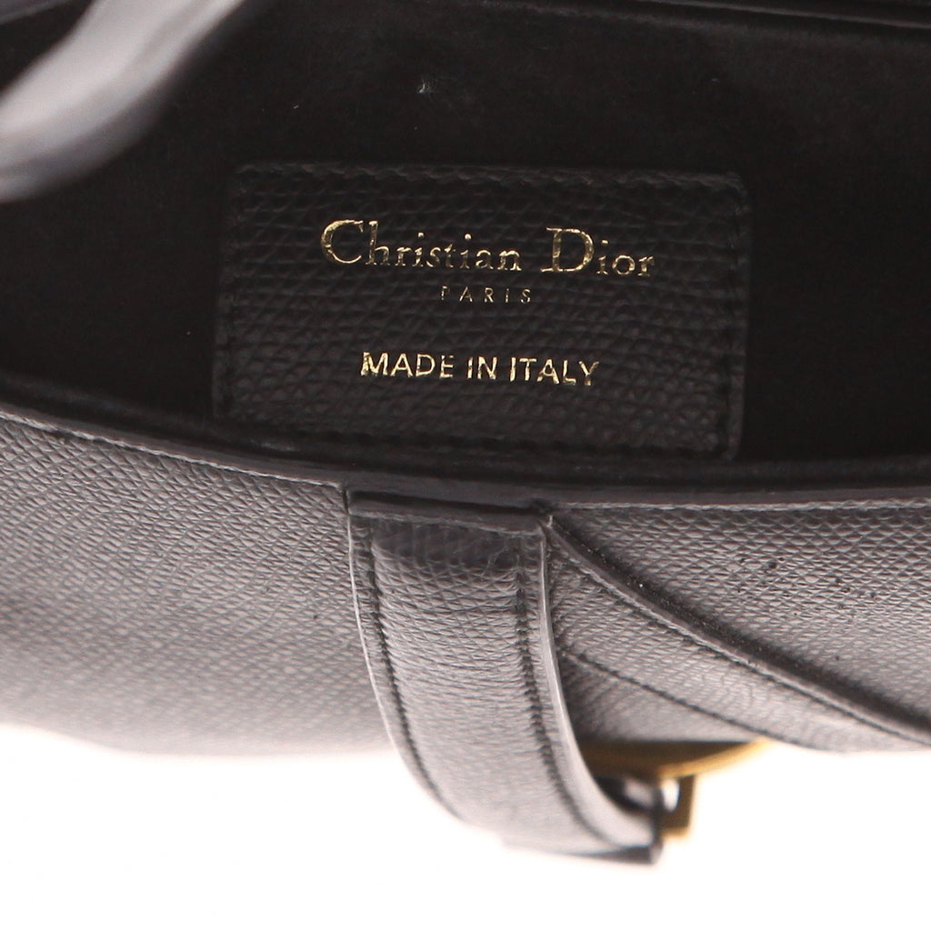 Christian Dior Saddle Bag black leather — bottom view with D clasp